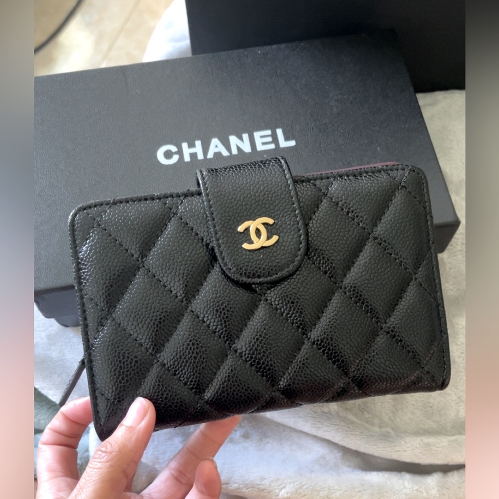 CHANEL Black Quilted Wallet with Gold Logo